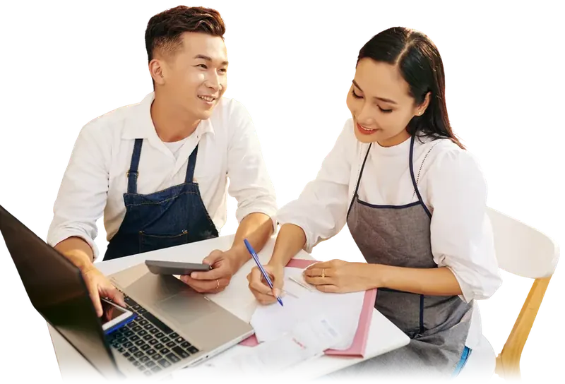 Two local business owners going over their plans together